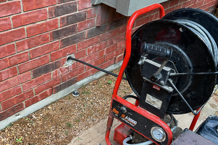 Professional hydrojetter machine used by CW Service Pros to clear stubborn drain and sewer line blockages with high-pressure water.