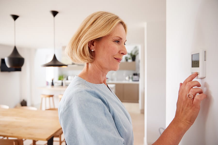 Adjusting residential thermostat for efficient heating and cooling