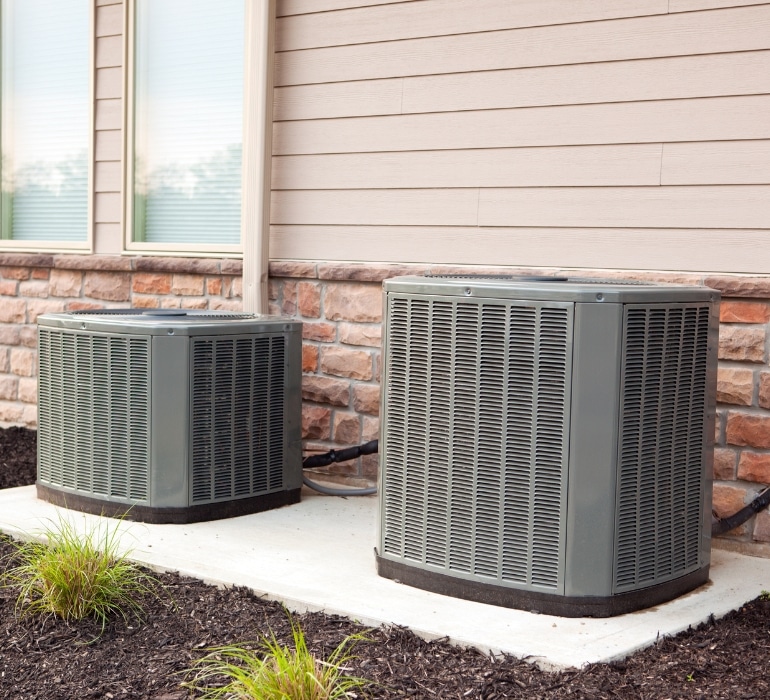 Professional air conditioning installation with outdoor units in Lewisville TX