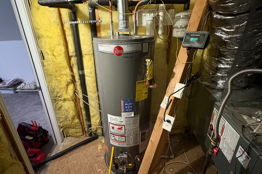 Recently installed or serviced residential attic water heater by CW Service Pros in a home in Texas.