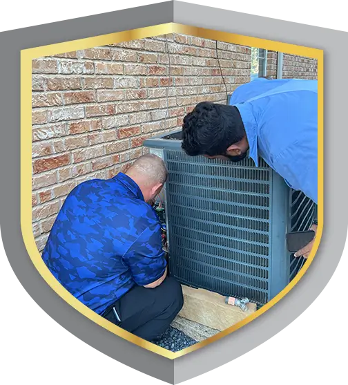 HVAC technicians inspecting outdoor AC