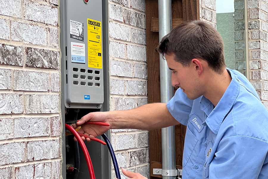 Tankless water heater repair by CW Service Pros plumber
