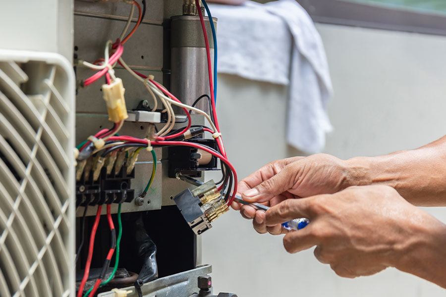 Licensed technician performing professional furnace repair service in Lewisville